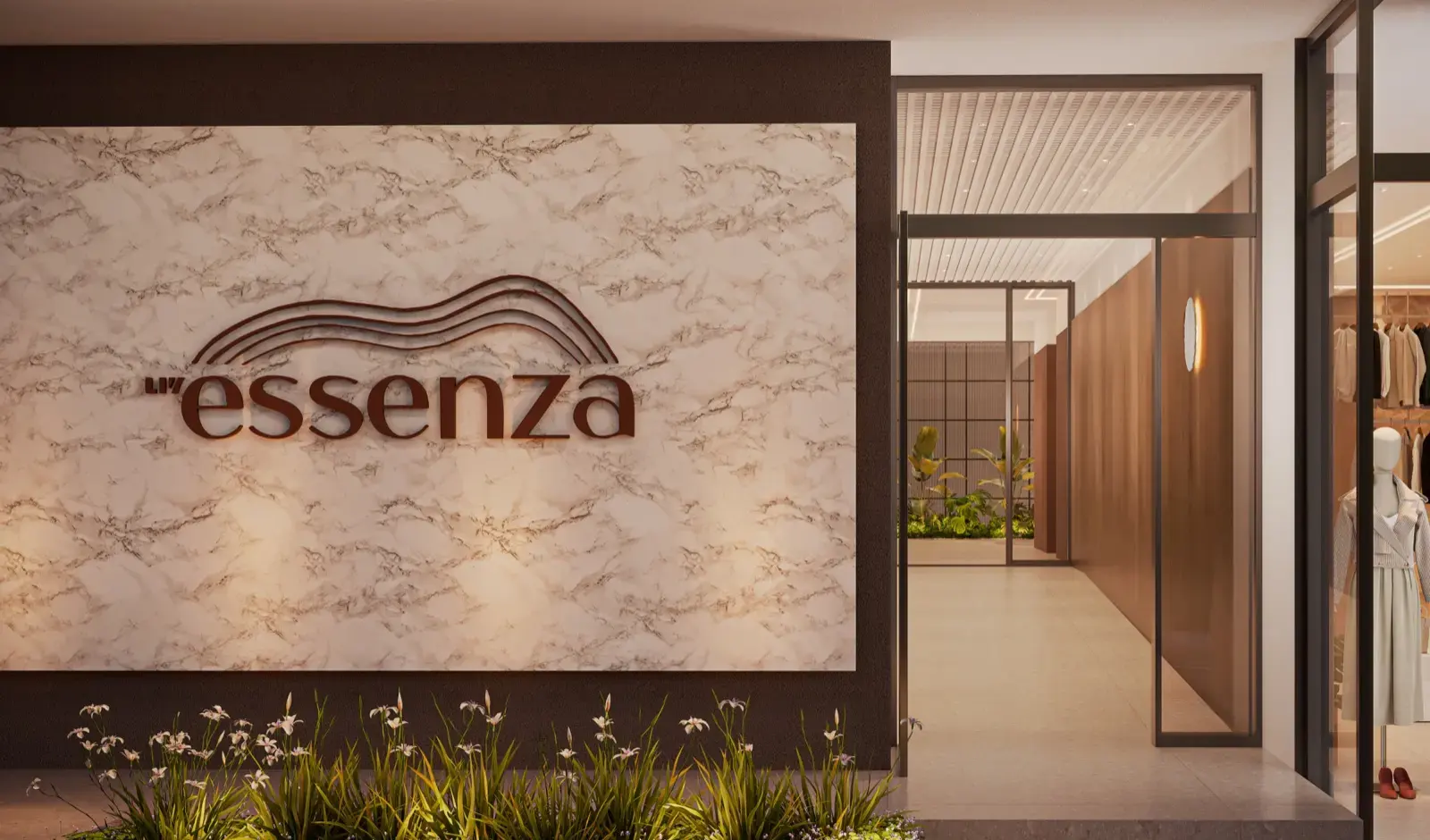 Acesso às lojas do Liv Essenza, com letreiro em painel de mármore